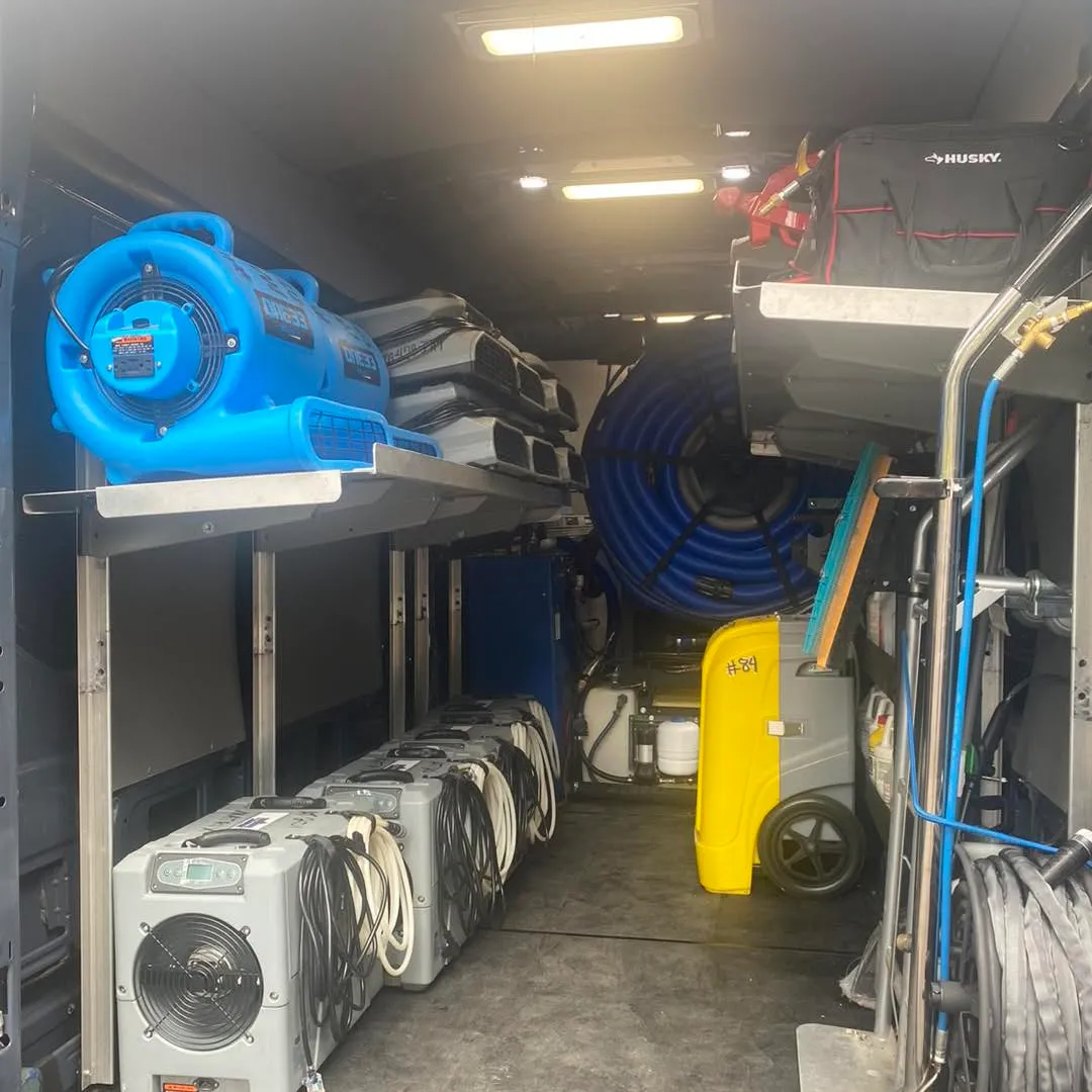 Extraction and drying equipment racked inside a Matrix van